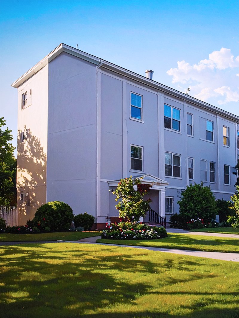 Property Management - Well maintained apartment building with manicured green lawn. Elizabeth NJ